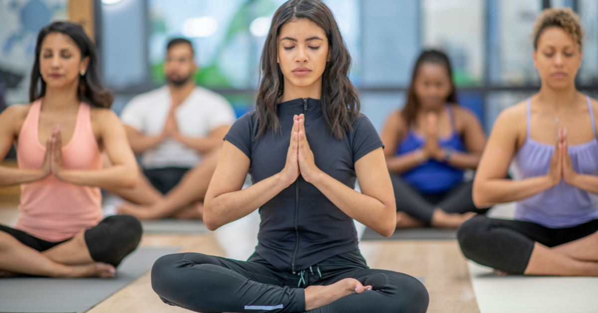 Teens practicing yoga poses, highlighting yoga poses beneficial for depression in teens.