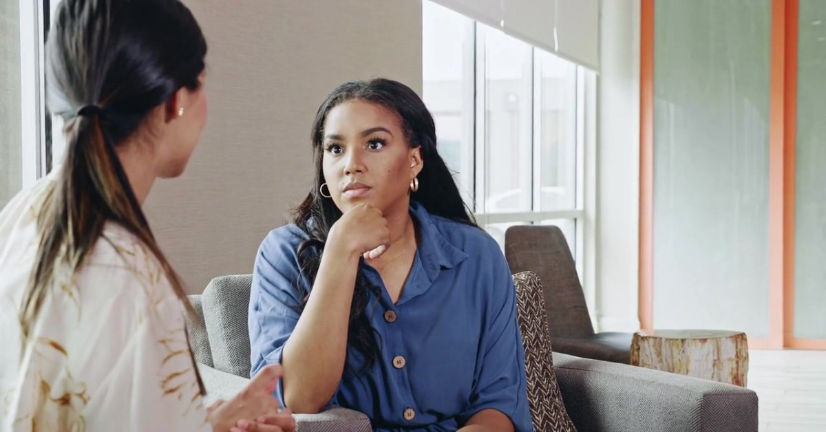 Two women engage in a deep conversation, emphasizing why mental health education matters greatly.