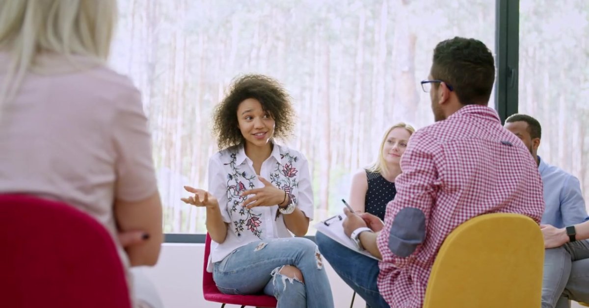 A group discusses openly, showcasing efforts in combating mental health stigma in society effectively.