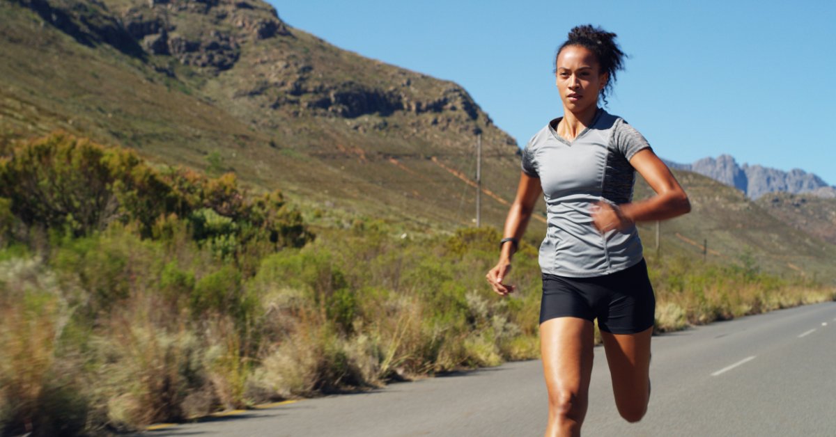 A woman runs outdoors, highlighting how weight stigma impacts both mental and physical health.