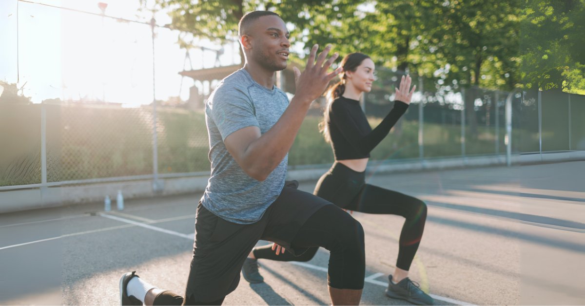 Two people exercise outdoors, demonstrating alternative therapies for anxiety disorders like physical activity.