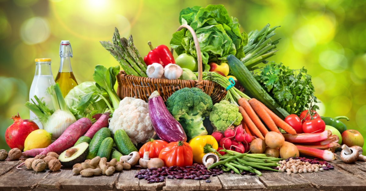 A variety of fresh vegetables and fruits on a table highlights nutrition's role in anxiety reduction.